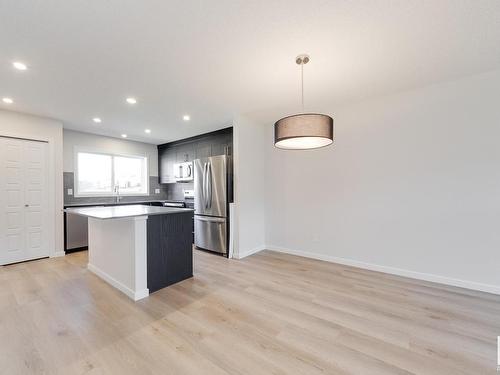 127 Stiles Link, Leduc, AB - Indoor Photo Showing Kitchen With Stainless Steel Kitchen