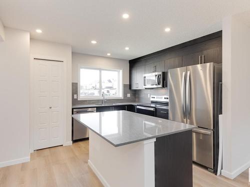 127 Stiles Link, Leduc, AB - Indoor Photo Showing Kitchen With Stainless Steel Kitchen With Upgraded Kitchen