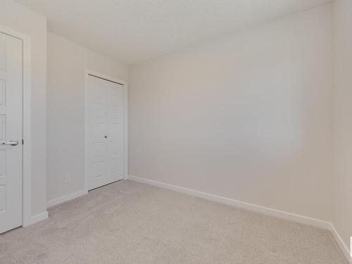 127 Stiles Link, Leduc, AB - Indoor Photo Showing Other Room