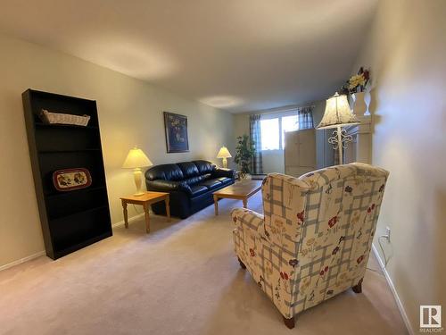 113 14811 51 Avenue, Edmonton, AB - Indoor Photo Showing Living Room