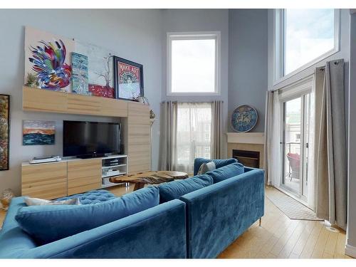 502 7905 96 Street, Edmonton, AB - Indoor Photo Showing Living Room With Fireplace