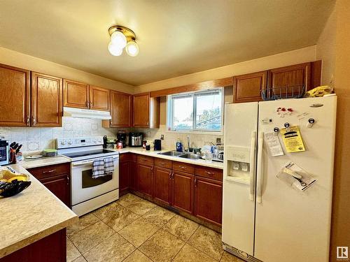 5144 49 Avenue, Drayton Valley, AB - Indoor Photo Showing Kitchen With Double Sink