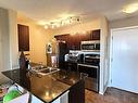 415 3207 James Mowatt Trail, Edmonton, AB  - Indoor Photo Showing Kitchen With Stainless Steel Kitchen With Double Sink 