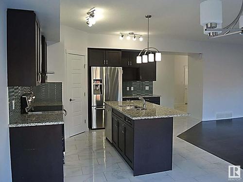 7315 Creighton Close, Edmonton, AB - Indoor Photo Showing Kitchen With Double Sink With Upgraded Kitchen