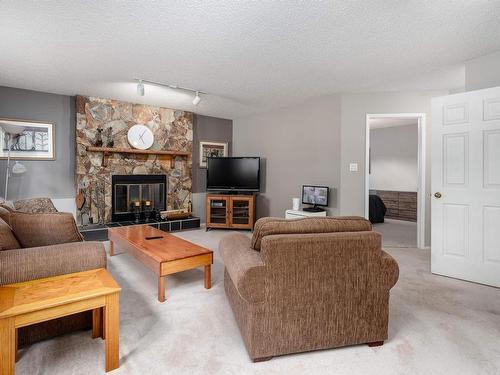 26 Lennox Drive, St. Albert, AB - Indoor Photo Showing Living Room With Fireplace