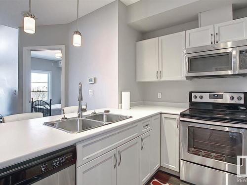 409 5029 Edgemont Boulevard, Edmonton, AB - Indoor Photo Showing Kitchen With Stainless Steel Kitchen With Double Sink