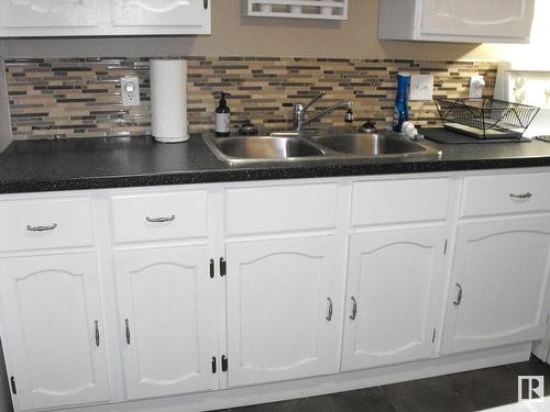 5217 49 Avenue, Elk Point, AB - Indoor Photo Showing Kitchen With Double Sink