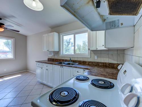 9516 127 Avenue, Edmonton, AB - Indoor Photo Showing Kitchen With Double Sink