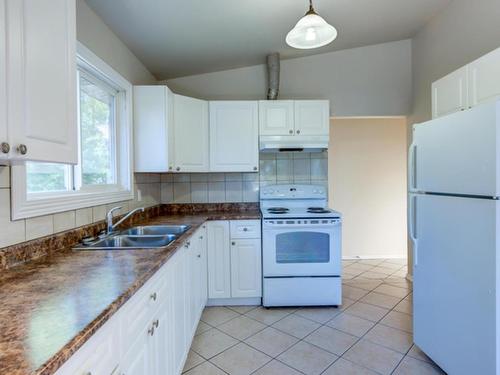 9516 127 Avenue, Edmonton, AB - Indoor Photo Showing Kitchen With Double Sink