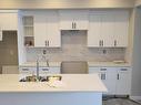 7060 181 Avenue, Edmonton, AB  - Indoor Photo Showing Kitchen With Double Sink 