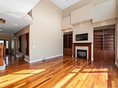 817 Hollands Landing Landing, Edmonton, AB - Indoor Photo Showing Living Room With Fireplace