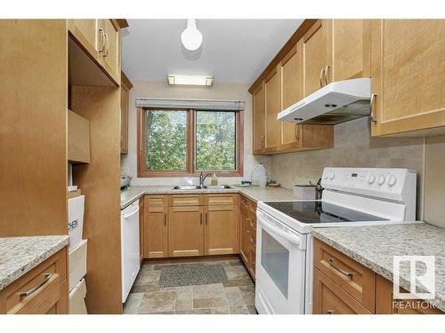 9801 92 Avenue Nw, Edmonton, AB - Indoor Photo Showing Kitchen With Double Sink