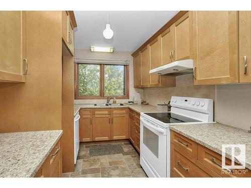 9801 92 Avenue Nw, Edmonton, AB - Indoor Photo Showing Kitchen With Double Sink