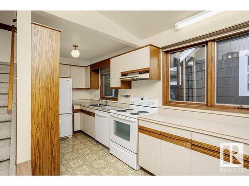 9803 92 Avenue, Edmonton, AB - Indoor Photo Showing Kitchen With Double Sink