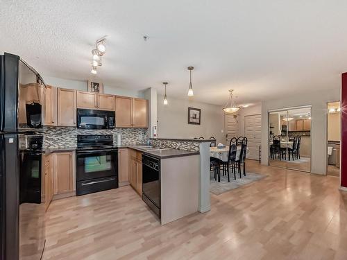 124 646 Mcallister Loop, Edmonton, AB - Indoor Photo Showing Kitchen With Upgraded Kitchen