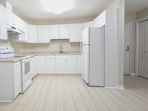 138 2741 55 Street Nw, Edmonton, AB - Indoor Photo Showing Kitchen With Double Sink