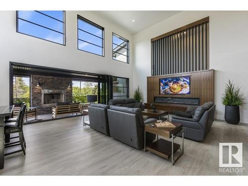 6 Lake Ridge Estates, Rural Parkland County, AB - Indoor Photo Showing Living Room With Fireplace