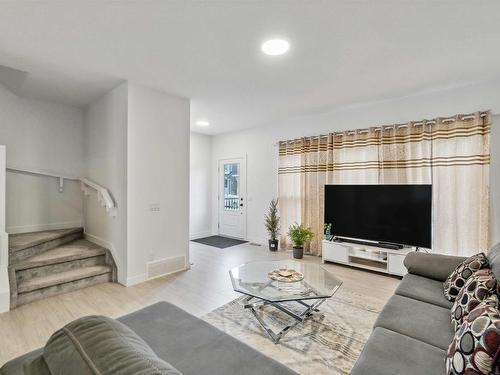 2931 Coughlan Green, Edmonton, AB - Indoor Photo Showing Living Room