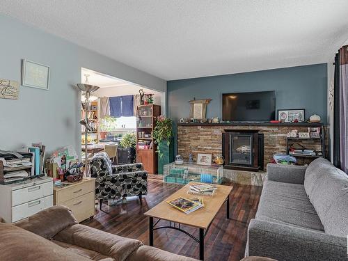 2A St Vital Avenue, St. Albert, AB - Indoor Photo Showing Living Room With Fireplace