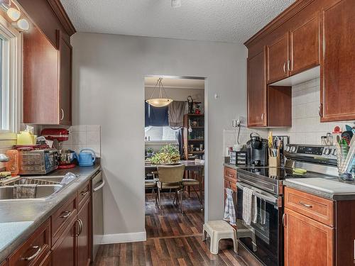 2A St Vital Avenue, St. Albert, AB - Indoor Photo Showing Kitchen With Double Sink