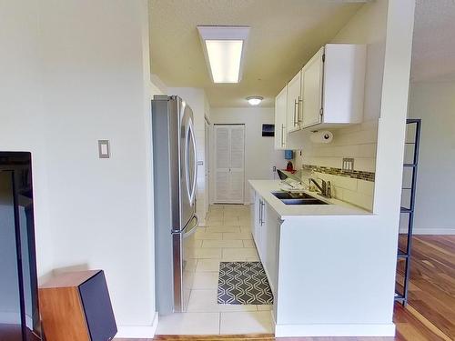 318 2323 119 Street Nw, Edmonton, AB - Indoor Photo Showing Kitchen With Double Sink