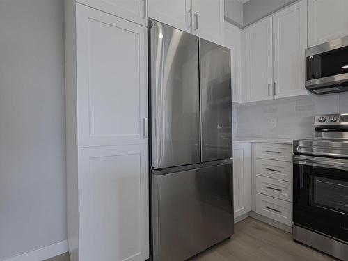 217 12804 140 Avenue, Edmonton, AB - Indoor Photo Showing Kitchen With Stainless Steel Kitchen