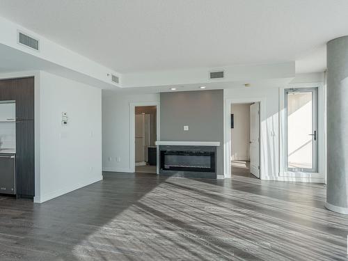 2204 9720 106 Street, Edmonton, AB - Indoor Photo Showing Living Room With Fireplace