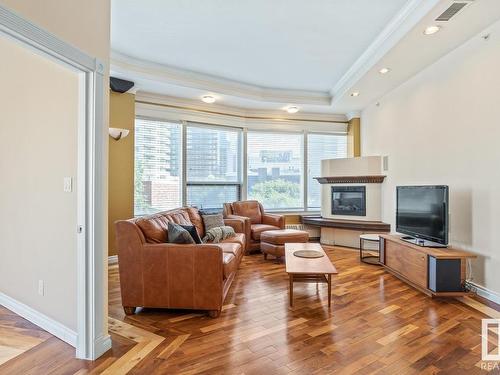 401 10106 105 Street, Edmonton, AB - Indoor Photo Showing Living Room With Fireplace