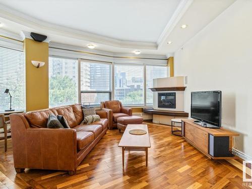 401 10106 105 Street, Edmonton, AB - Indoor Photo Showing Living Room With Fireplace