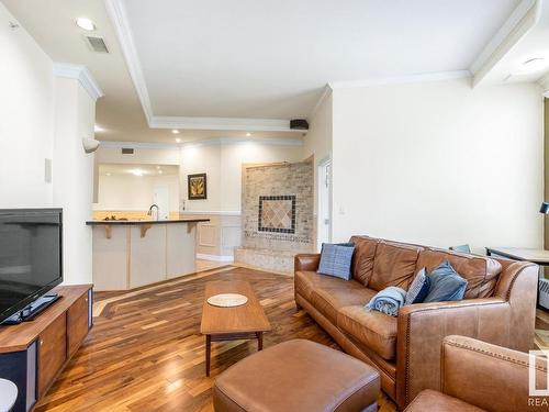 401 10106 105 Street, Edmonton, AB - Indoor Photo Showing Living Room With Fireplace