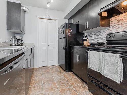 414 5390 Chappelle Road, Edmonton, AB - Indoor Photo Showing Kitchen