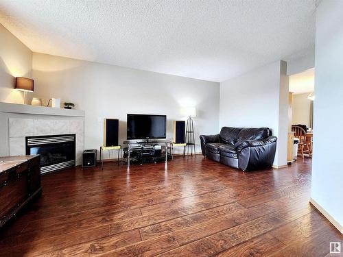 71 10909 106 Street, Edmonton, AB - Indoor Photo Showing Living Room With Fireplace