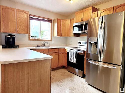 71 10909 106 Street, Edmonton, AB - Indoor Photo Showing Kitchen With Double Sink