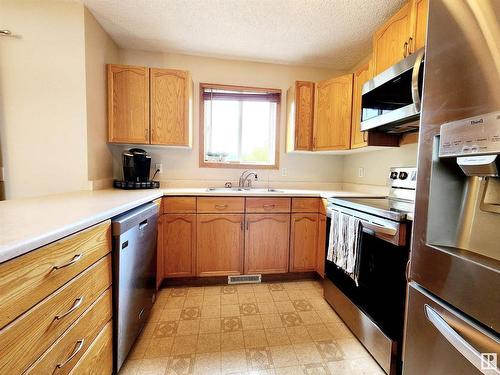 71 10909 106 Street, Edmonton, AB - Indoor Photo Showing Kitchen With Double Sink