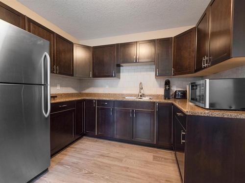 11436 97 Street, Edmonton, AB - Indoor Photo Showing Kitchen With Double Sink