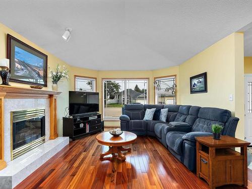 6 Baker Place, Leduc, AB - Indoor Photo Showing Living Room With Fireplace