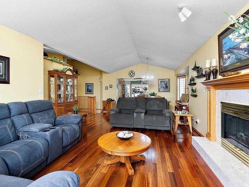 6 Baker Place, Leduc, AB - Indoor Photo Showing Living Room With Fireplace