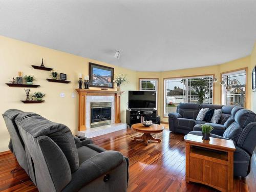 6 Baker Place, Leduc, AB - Indoor Photo Showing Living Room With Fireplace