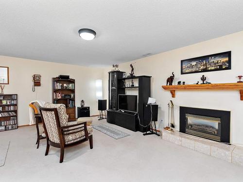 6 Baker Place, Leduc, AB - Indoor Photo Showing Living Room With Fireplace