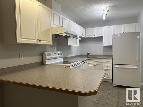 112 7511 171 Street, Edmonton, AB - Indoor Photo Showing Kitchen With Double Sink