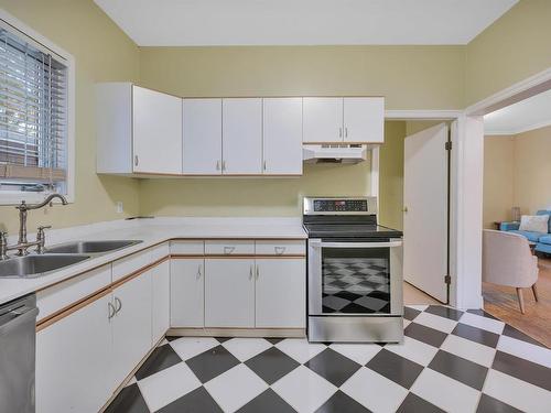 10722 92 Street, Edmonton, AB - Indoor Photo Showing Kitchen With Double Sink