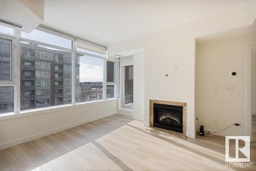 414 2606 109 Street, Edmonton, AB - Indoor Photo Showing Living Room With Fireplace