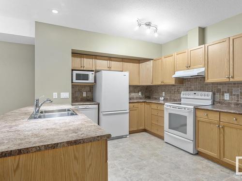 105 801 11 Street, Cold Lake, AB - Indoor Photo Showing Kitchen With Double Sink