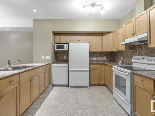 105 801 11 Street, Cold Lake, AB - Indoor Photo Showing Kitchen With Double Sink