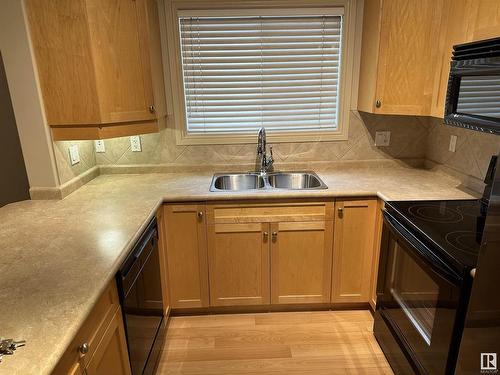 112 14612 125 Street, Edmonton, AB - Indoor Photo Showing Kitchen With Double Sink