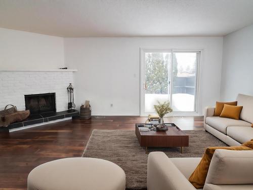 2730 136A Avenue, Edmonton, AB - Indoor Photo Showing Living Room With Fireplace