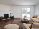 2730 136A Avenue, Edmonton, AB  - Indoor Photo Showing Living Room With Fireplace 