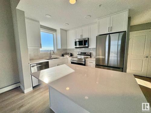 428 12804 140 Avenue, Edmonton, AB - Indoor Photo Showing Kitchen With Double Sink