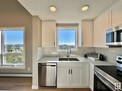 428 12804 140 Avenue, Edmonton, AB - Indoor Photo Showing Kitchen With Double Sink