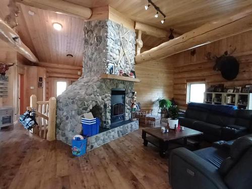 58211 Rr 31, Rural Barrhead County, AB - Indoor Photo Showing Living Room With Fireplace